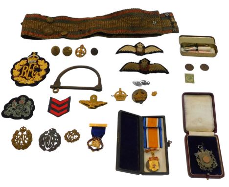A group of army and RAF related insignia, to include cloth badges, cap badges, RFC emblem badge, a silver fob, Bradford Engin