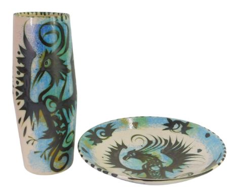A Celtic pottery Newlyn vase, of cylindrical form decorated with a phoenic in black against a mottled blue, orange and white 
