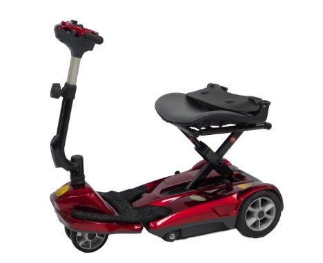 A Middletons Discovery Auto Fold three wheel mobility scooter, in red trim, with charger and key.
WARNING! This lot contains 