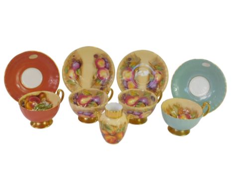 A group of Aynsley Orchard Gold pattern porcelain wares, comprising four teacups and saucers, and a twin-handled miniature va