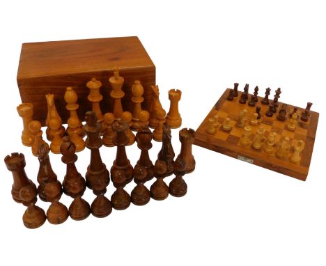 Two carved hardwood chess sets, height of king 16cm high and 5cm high, each boxed. 