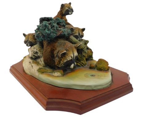 A Bossons Crown Collection First Course racoons figure group, limited edition 2750/9500, on a hardwood base, 18cm high, with 