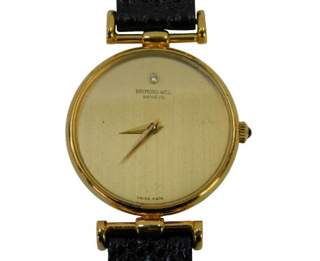 A Raymond Weil lady's 18ct gold plated wristwatch, the brushed gold coloured circular dial with a white stone set at the twel