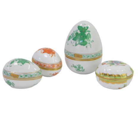 Four Herend of Hungary porcelain trinket dishes, two formed as eggs, in green painted Apponyi or Chinese bouquet pattern, the