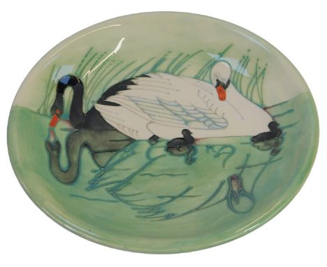 A Moorcroft pottery Swan pattern plate, designed by Sally Tuffin, limited edition number 173/350, year stamp for 1991, impres