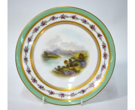 A Royal Worcester cabinet plate handpainted with a mountainous lake landscape, date cypher 1906, 22.7 cm diam