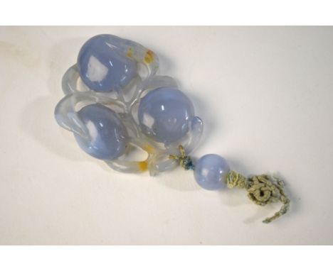 AMENDED DESCRIPTION A carved blue jade or jade style pendant of fruit and vine, approx 4 x 3 cm excluding attached bead