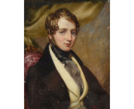 A 19th century portrait miniature on ivory of a young gentleman, unsigned, 10 x 7.5 cm, in gilt metal and glazed, ebonised fr