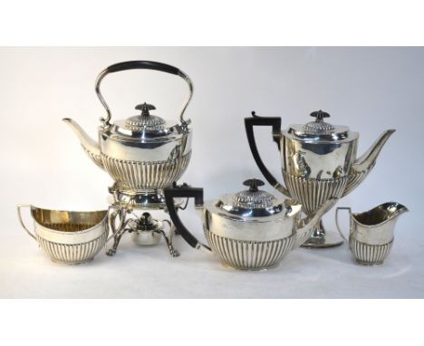 An oval half-reeded silver five-piece tea/coffee service including kettle on stand with burner, Martin, Hall & Co., Ltd., She