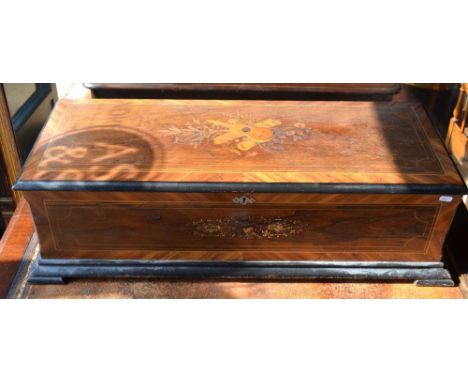 A large marquetry inlaid kingwood and ebonised Swiss cylinder music box, playing ten airs on a 42 cm long pinned steel cylind