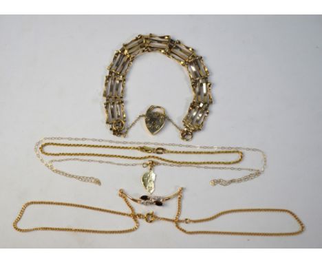 A 9ct four row gate bracelet with padlock to/w a 9ct yellow gold anklet, and a yellow metal necklace with blue and white ston