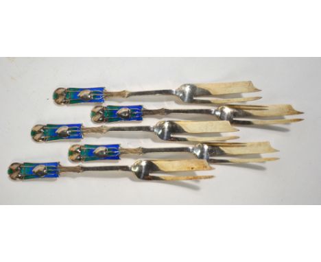 Liberty: a set of five silver and enamel pastry forks with stylised foliate design finials in the manner of Archibald Knox, B