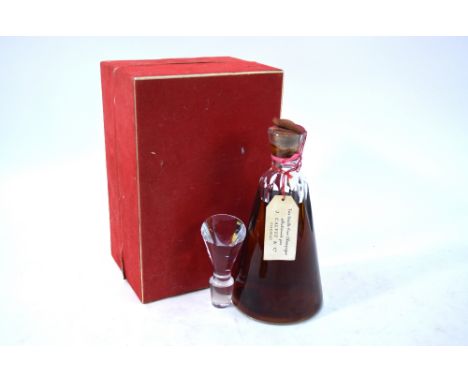 A bottle of J Calvet & Co Cognac in cut and pressed glass special edition Baccarat decanter c/w stopper in lined presentation