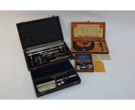 A good quality cased set of drawing instruments, including sectional 40" compass, unnamed, to/w a Moore & Wright cased microm