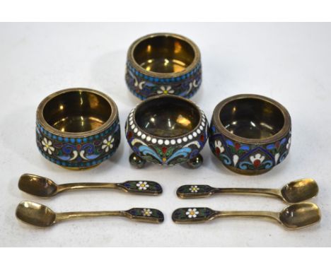 Four various small Russian 88 zol, gilt and plique a jour enamel open salts with spoons, maker A P