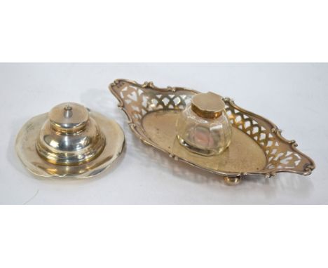 An Edwardian pierced silver inkstand with cut glass bottle, William Hair Haseler, Birmingham 1906, to/w an inkwell with hinge