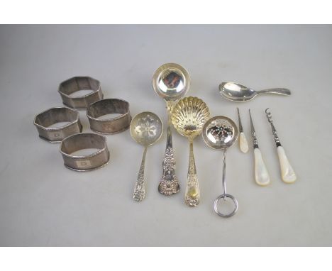 A set of four engine-turned silver napkin rings, Birmingham 1914, to/w a caddy spoon, Birmingham 1968, four small electroplat