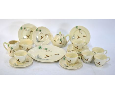 Royal Doulton tea service, 'The Coppice' pattern, comprising a small teapot, milk jug, sugar bowl, cake plate, six side plate