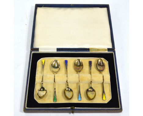 An Art Deco cased set of six silver gilt and Harlequin enamel coffee spoons, Deakin & Francis, Birmingham 1933 (little used) 
