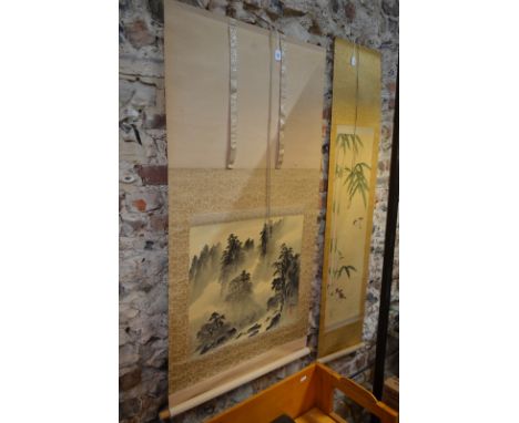 Two Asian scroll pictures, comprising: a Japanese kacho-ga of birds and bamboo, 90 x 24cm; and an ethereal, Chinese mountaino