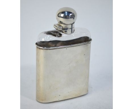A Victorian cut glass hip flask with hinged bayonet bun cover and detachable curved beaker, James Dixon & Son, Sheffield 1899