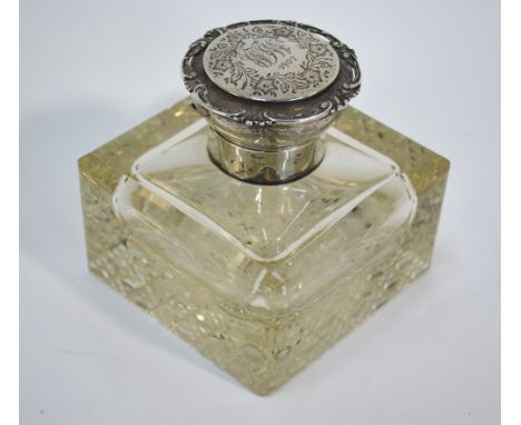 An Edwardian heavy glass inkwell with hobnail-cut base and silver collar and engraved hinged cover, London 1901 (probably - m