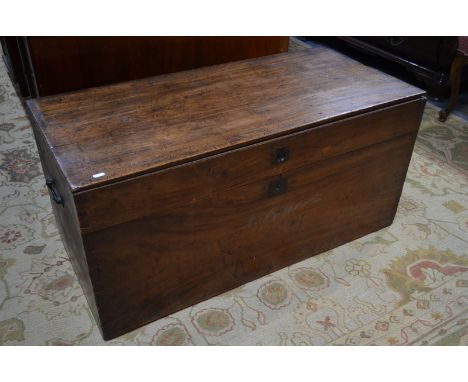 A Victorian camphor wood campaign trunk, with iron carrying handle, stencilled 'J Harris' to the face, 103 cm wide x 49 cm x 