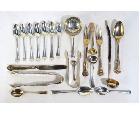 A quantity of Georgian and later silver flatware, including teaspoons, Christening spoons and forks, sugar tongs and tea stra