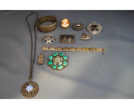 A Robert Allison Celtic brooch; a Caithness glass silver brooch, for 1977; a John Fraser of Inverness agate set pendant; and 