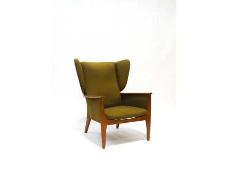 A Parker Knoll wing back armchair with green upholstery, 78cm at widest point, sold as a collectors' item only