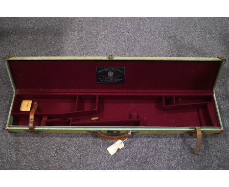 A canvas and leather bound shotgun case, with stencilled initials R M-D, the felt lined interior with Holland and Holland lab
