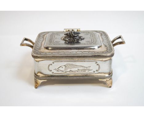 A silver plated two handled sardine dish by Walker & Hall, with glass liner, the lid with engraved decoration and shell finia
