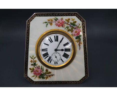 A silver and guilloche enamel boudoir clock, Birmingham 1928, the tapered rectangular panel with flowering boughs, easel back