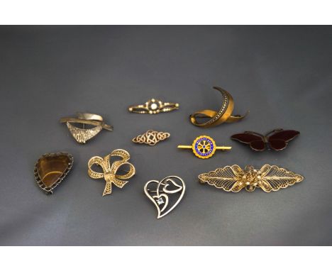 A Marius Hammer enamel butterfly brooch; with nine other silver and silver coloured brooches