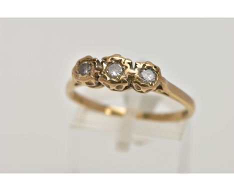 A 9CT GOLD, THREE STONE DIAMOND RING, designed with three graduated, round brilliant cut diamonds, illusion set, stamped diam