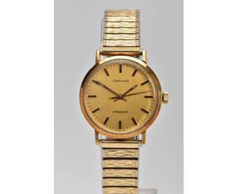 A GENTLEMENS 'LONGINES CONQUEST' WRISTWATCH, round gold dial signed 'Longines conquest', baton markers, gold tone hands, with
