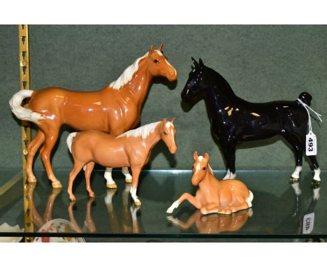 FOUR BESWICK HORSES, comprising Hackney (Black Magic of Nork) No.1361, and three palomino colourways Mare No.915 (nibbles to 
