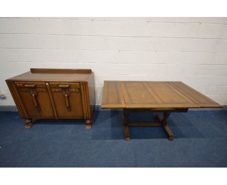 AN ART DECO OAK DRAW LEAF DINING TABLE, open length 152cm x closed length 91cm x depth 91cm x height 75cm and a sideboard wit