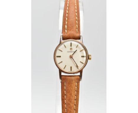 A LADY'S 9CT GOLD 'OMEGA' WRISTWATCH, hand wound movement, round cream dial signed 'Omega', baton markers, black hands, withi