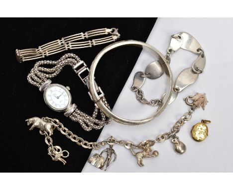 A BAG OF ASSORTED SILVER AND WHITE METAL JEWELLERY, to include a silver hinged bangle, fitted with a push pin clasp, floral e