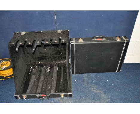 TWO STAGG FOLDING GUITAR STAGE STANDS closes to look like a cymbal case and holding six instruments when open