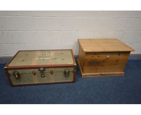 A VINTAGE TRAVELLING TRUNK, singed Robinson &amp; Co Ltd, with an internal tray, width 92cm x depth 52cm x height 23cm, and a