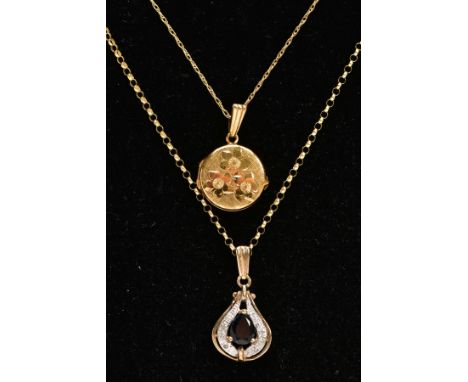 TWO 9CT GOLD PENDANT NECKLACES, the first a floral detailed circular locket, hallmarked 9ct gold London, fitted with a tapere