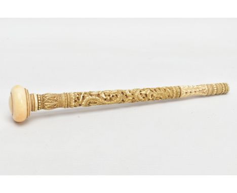 A CARVED IVORY PARASOL HANDLE, carved with a wraparound dragon, butterflies, foliage etc, tapered form with a round base, len