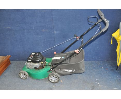 A QUALCAST XSS41C PETROL LAWN MOWER with a Briggs and Stratton 450 series engine (starts and in working order)