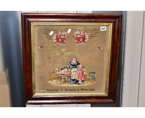 A FRAMED AND GLAZED WOOLWORK DATED 1848, by Catherine Blomileys, depicting mother, daughter and cat, on kitchen table, size 3