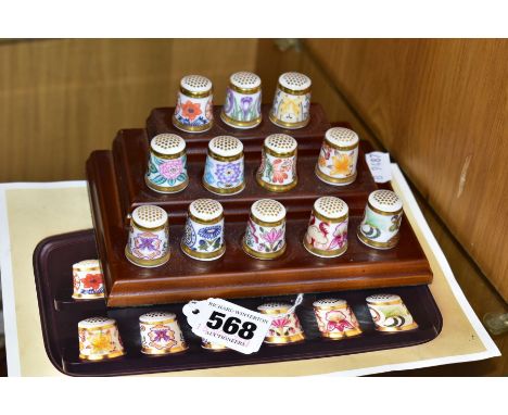 A SET OF TWELVE ROYAL CROWN DERBY COLLECTORS THIMBLES, 'The Chatsworth Collection', on a wooden stand, with leaflet (Conditio