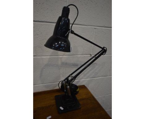 A HEBERT TERRY BLACK FINISH ANGLE POISE DESK LAMP, on a stepped base