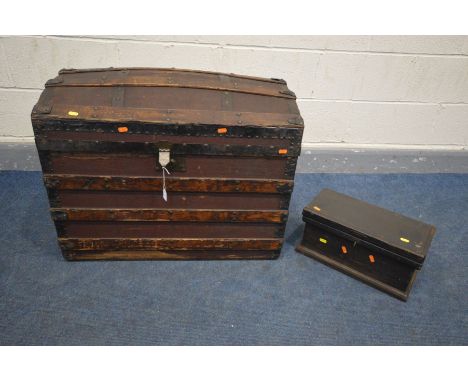 AN EARLY 20TH CENTURY CANVAS AND WOODEN BANDED DOMED TRUNK, to inside of lid 'T.EVINS, PRACTICAL PORTMANTEAU, TRUNK &amp; BAG