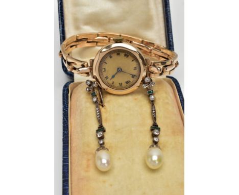 A LADIES 9CT GOLD WRISTWATCH AND A PAIR OF DROP EARRINGS, the watch with a hand wound movement, round discoloured dial, Roman